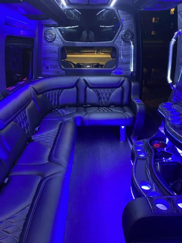 Inside party bus vegas style. Neon lights with black upholstery. Legendary Vegas!